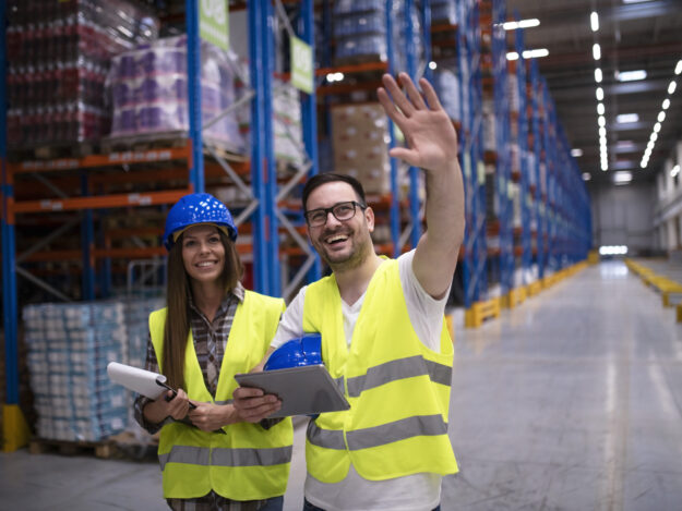 Warehouse workers organizing distribution of products to the market. Warehouse workers organizing distribution of products to the market.